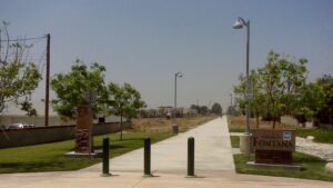 Pacific Electric Inland Empire Trail sign and trail view in Fontana