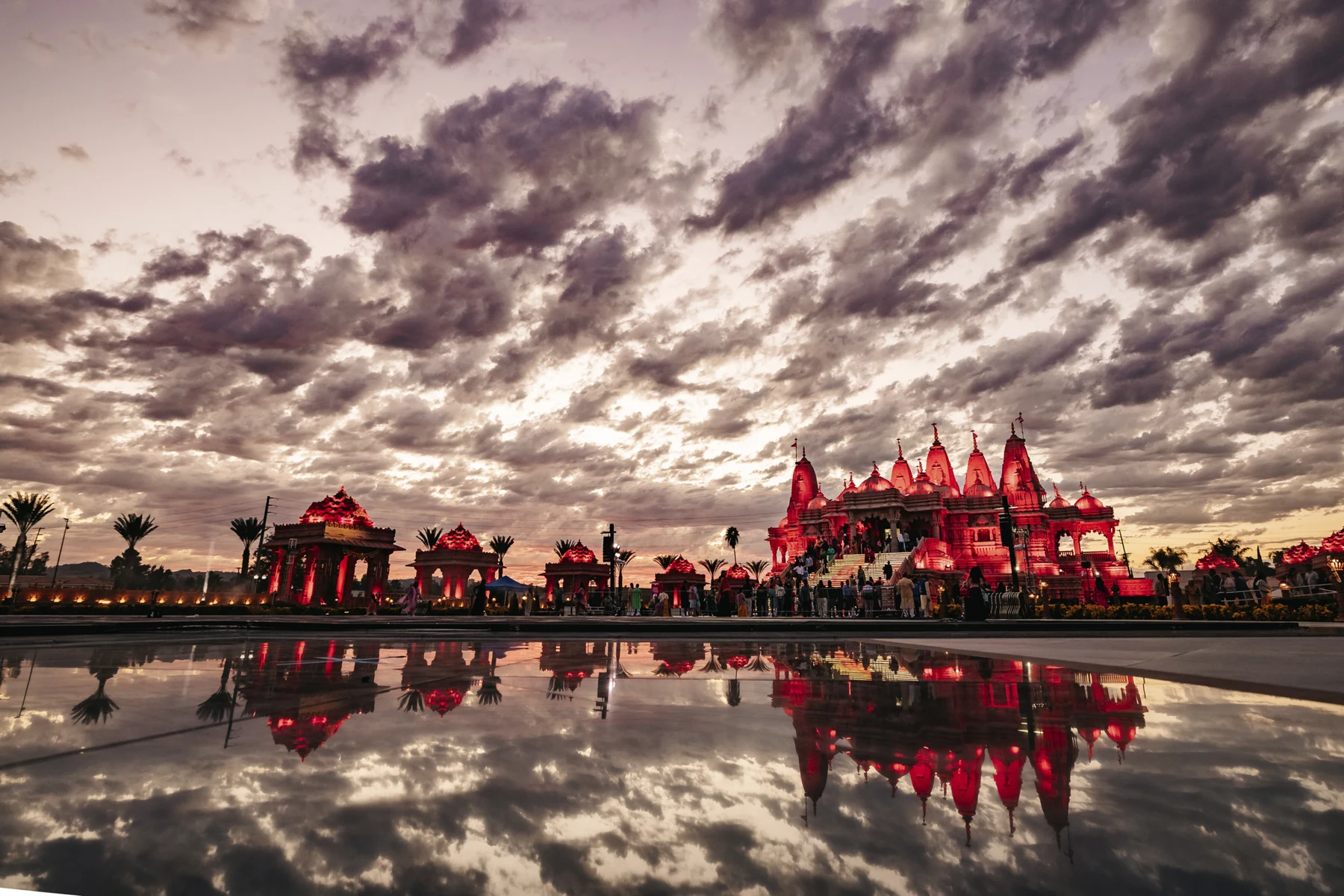 Mandir illuminated at dusk during a past event; date not supplied