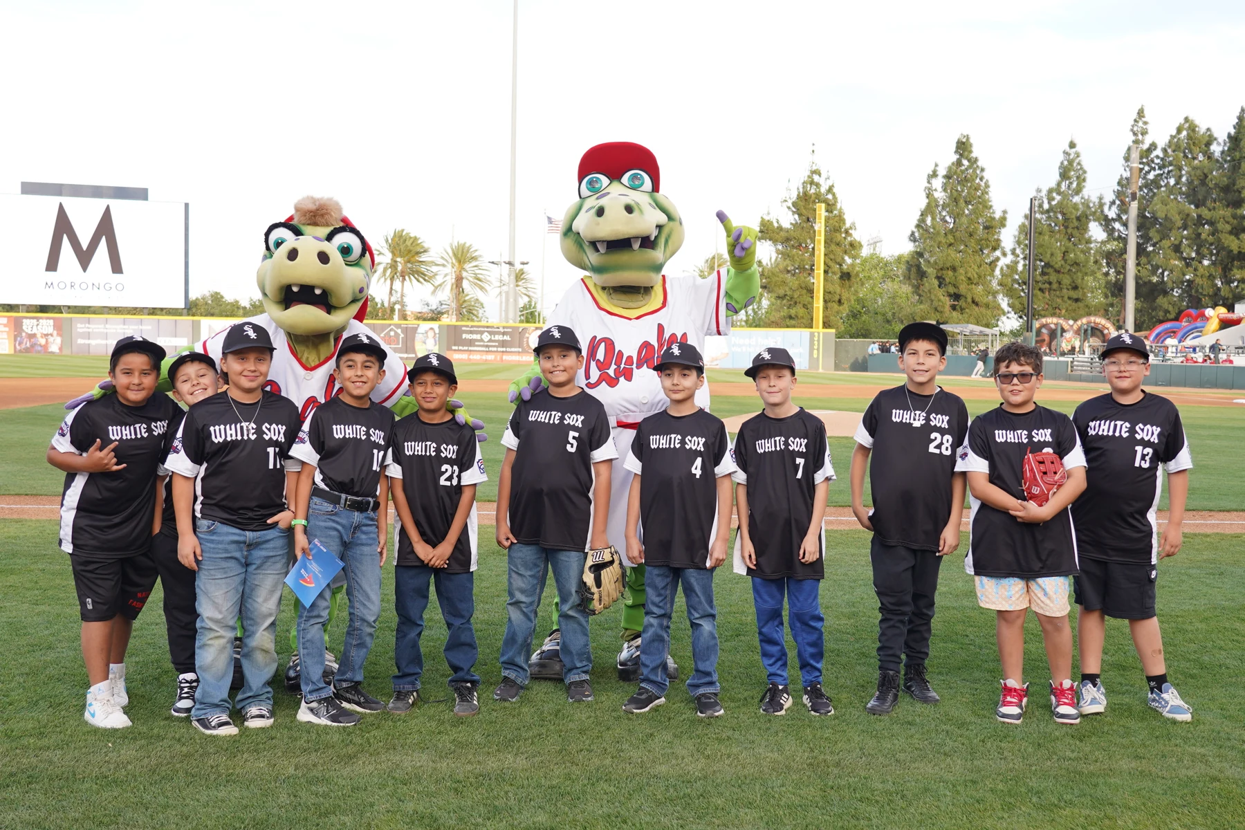 Youth baseball group with Quakes mascots at Morongo Field