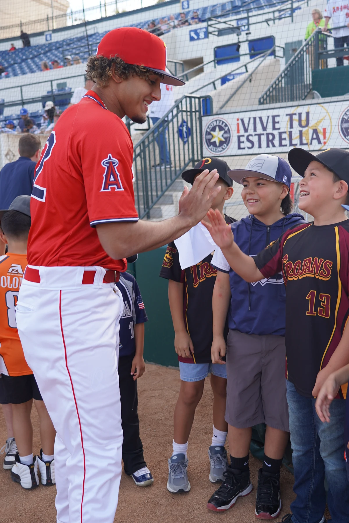 Player greeting young fans at Morongo Field