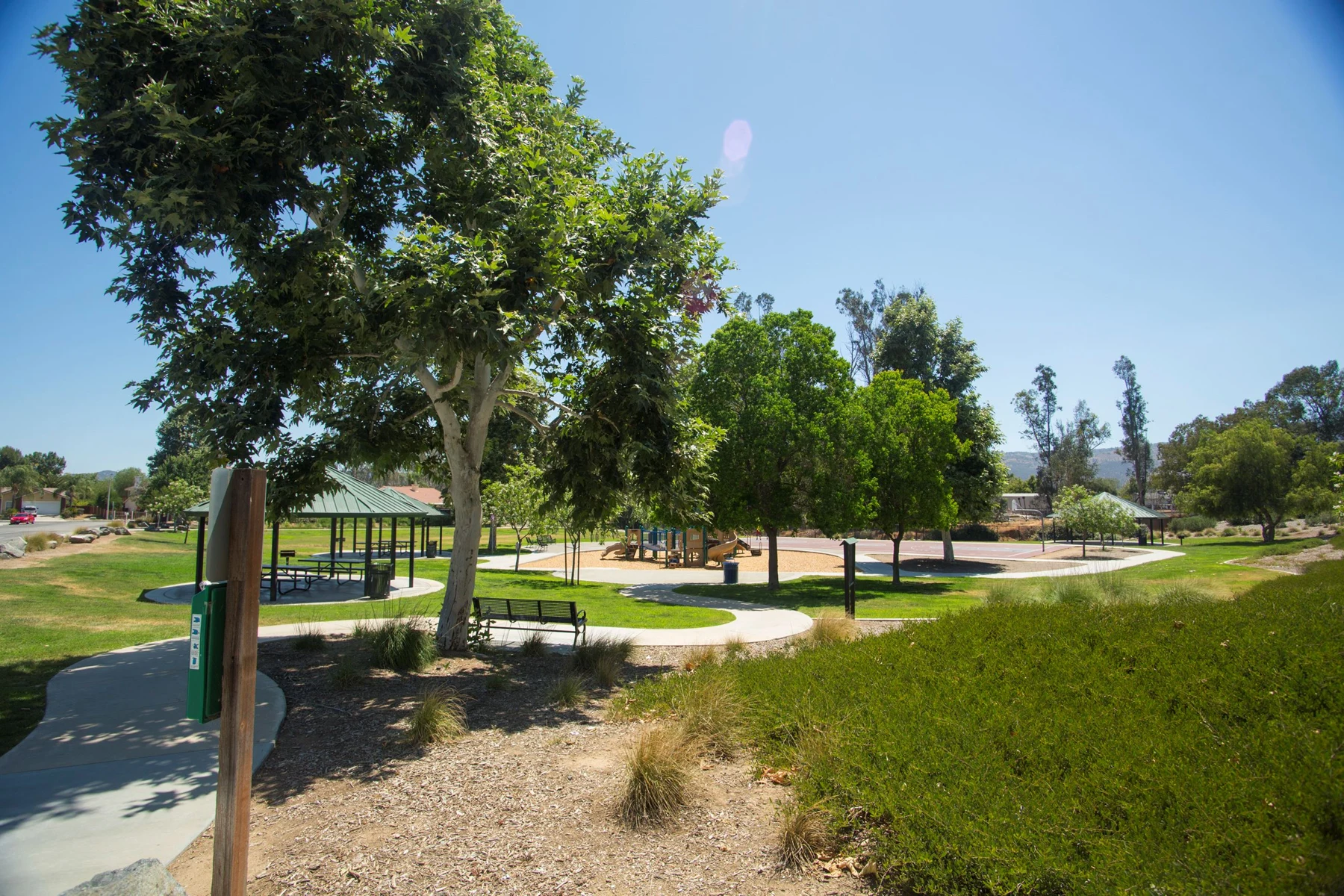 Walking path and picnic shelter at Windsong Park