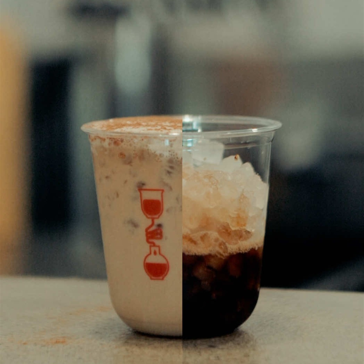 Half-finished Iced Cappoch showing coffee, ice, milk, and foam at Gaffle Coffee