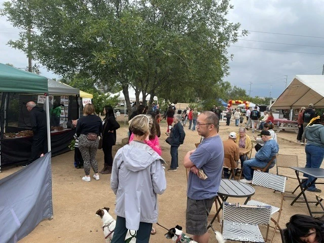 Shoppers and seating at the market