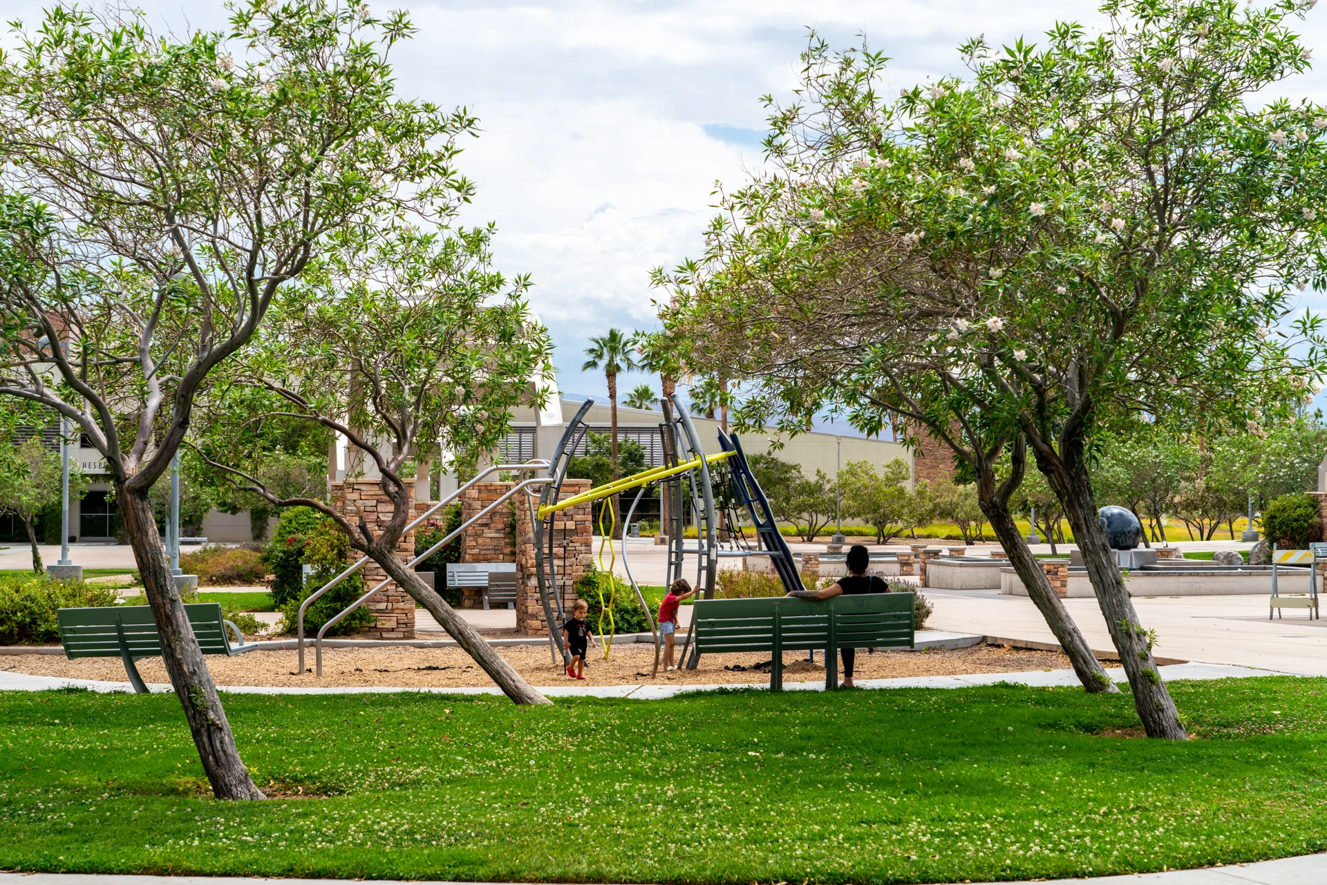 Playground and shaded seating at Hesperia Civic Plaza Park