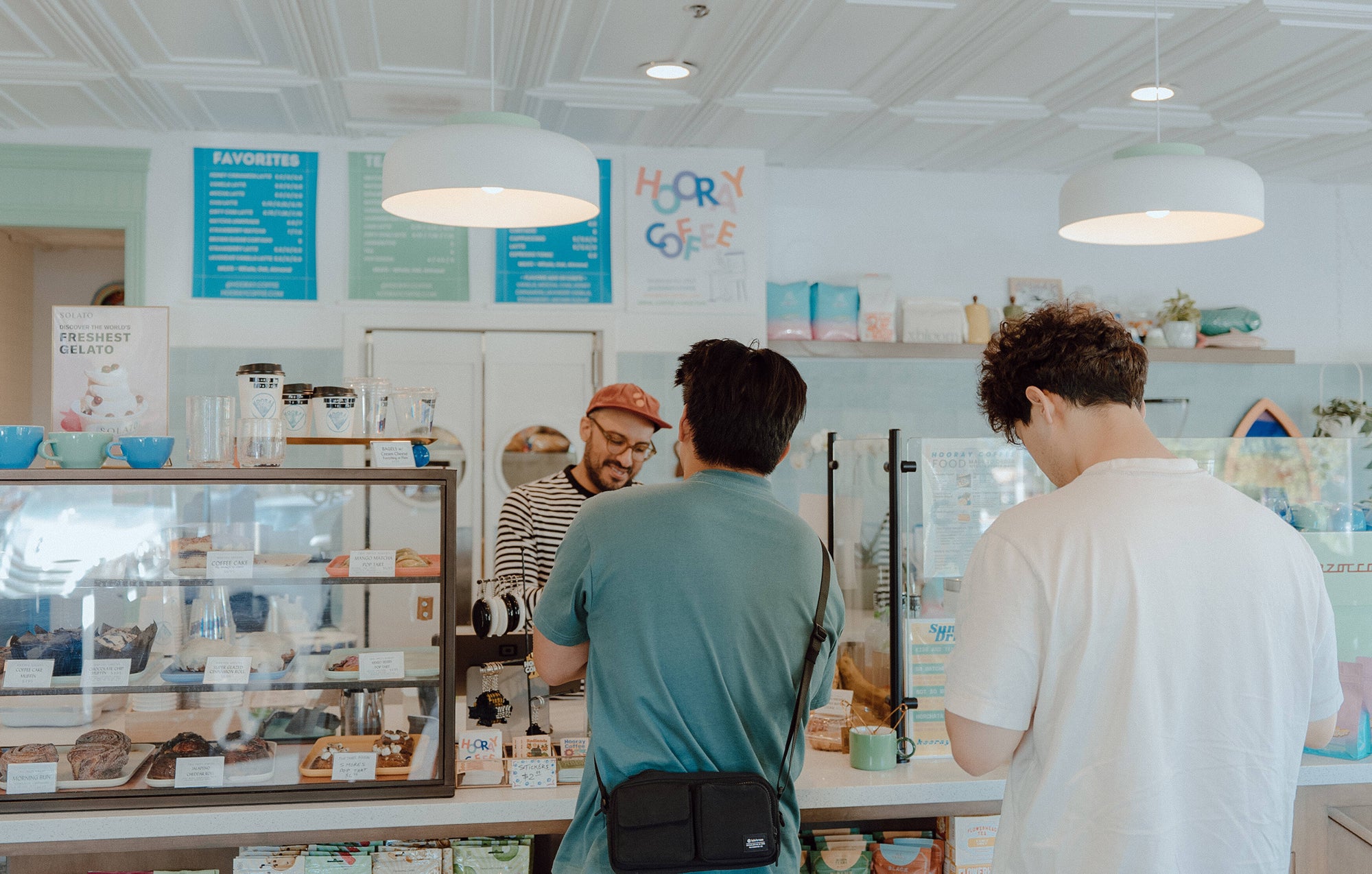 Customer ordering at the Hooray Coffee counter in Redlands