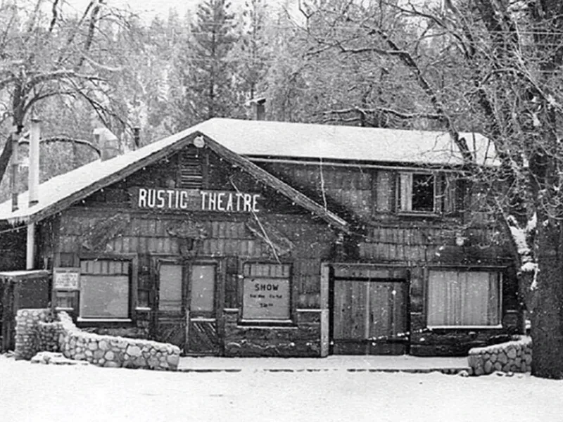 Historical photograph of the Rustic Theatre in winter
