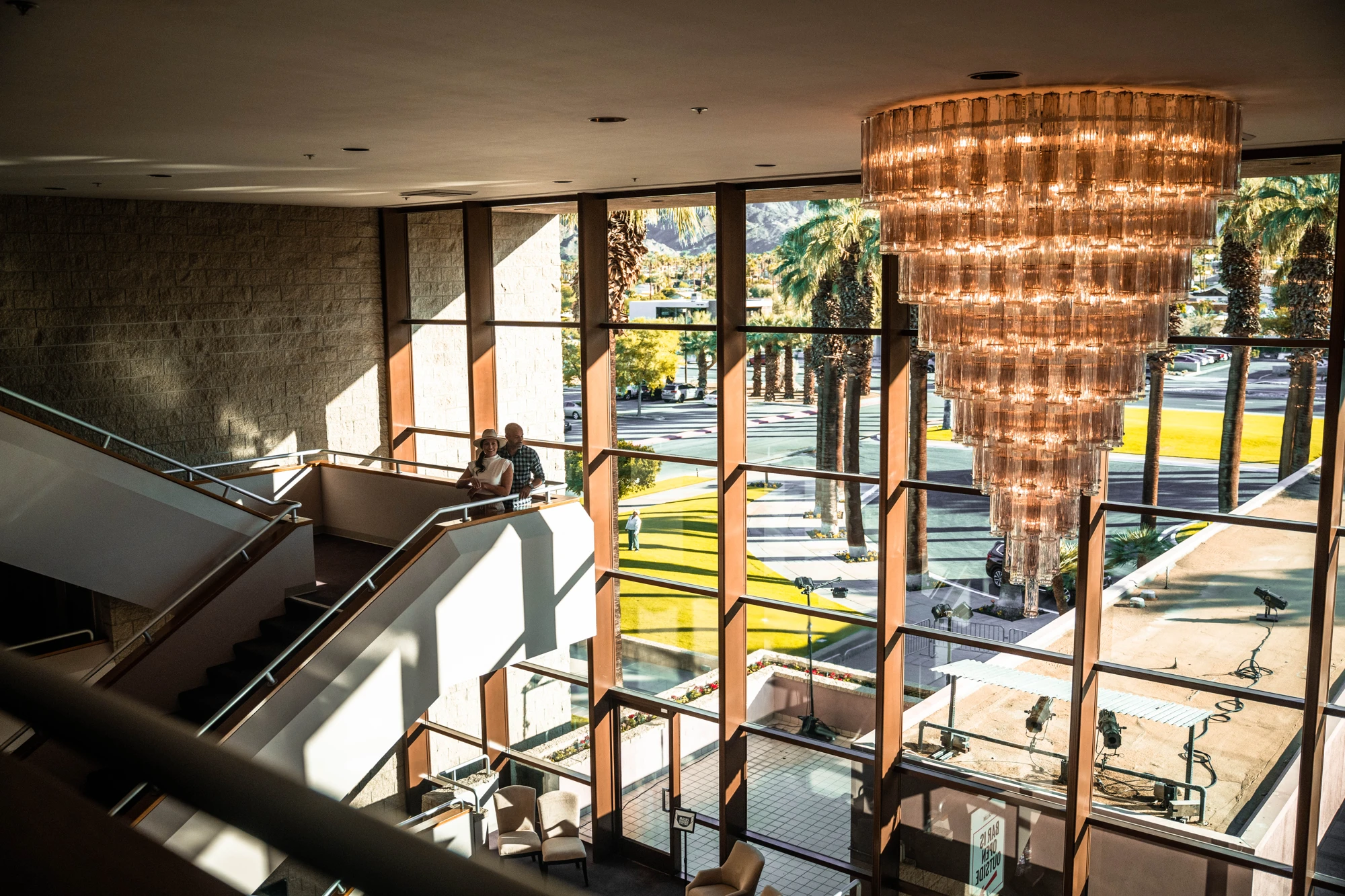 Lobby staircase and chandelier at McCallum Theatre