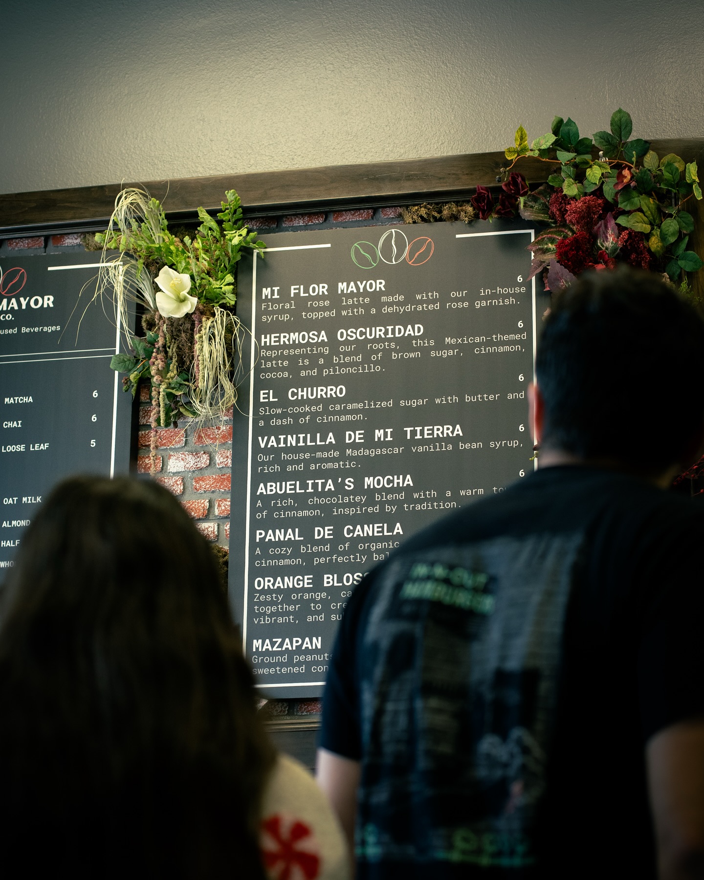 Mi Flor Mayor Coffee & Co. menu board with Mexican-inspired specialty drinks in Fontana
