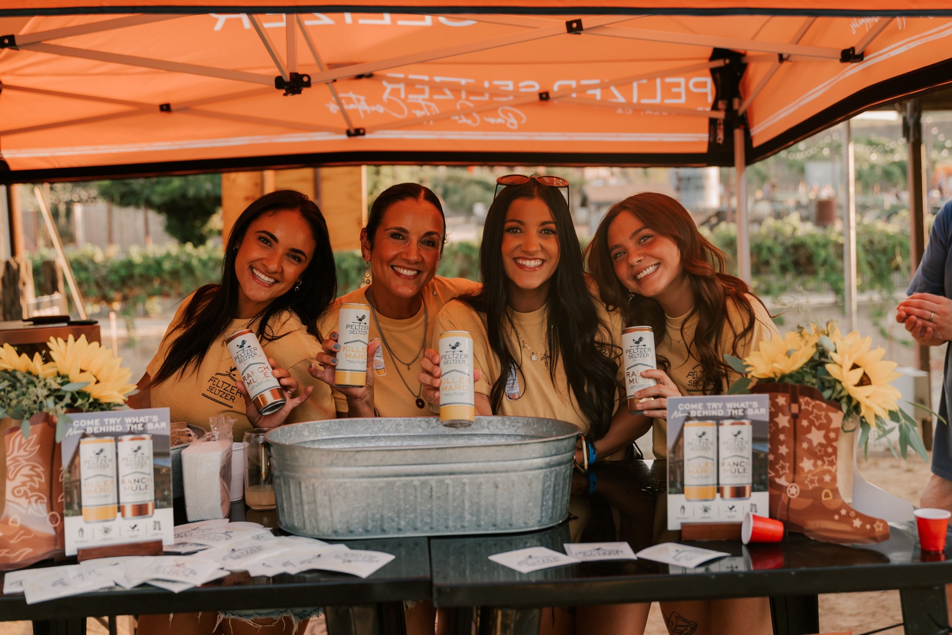 Peltzer Seltzer team at a Nashville Nights drink stand