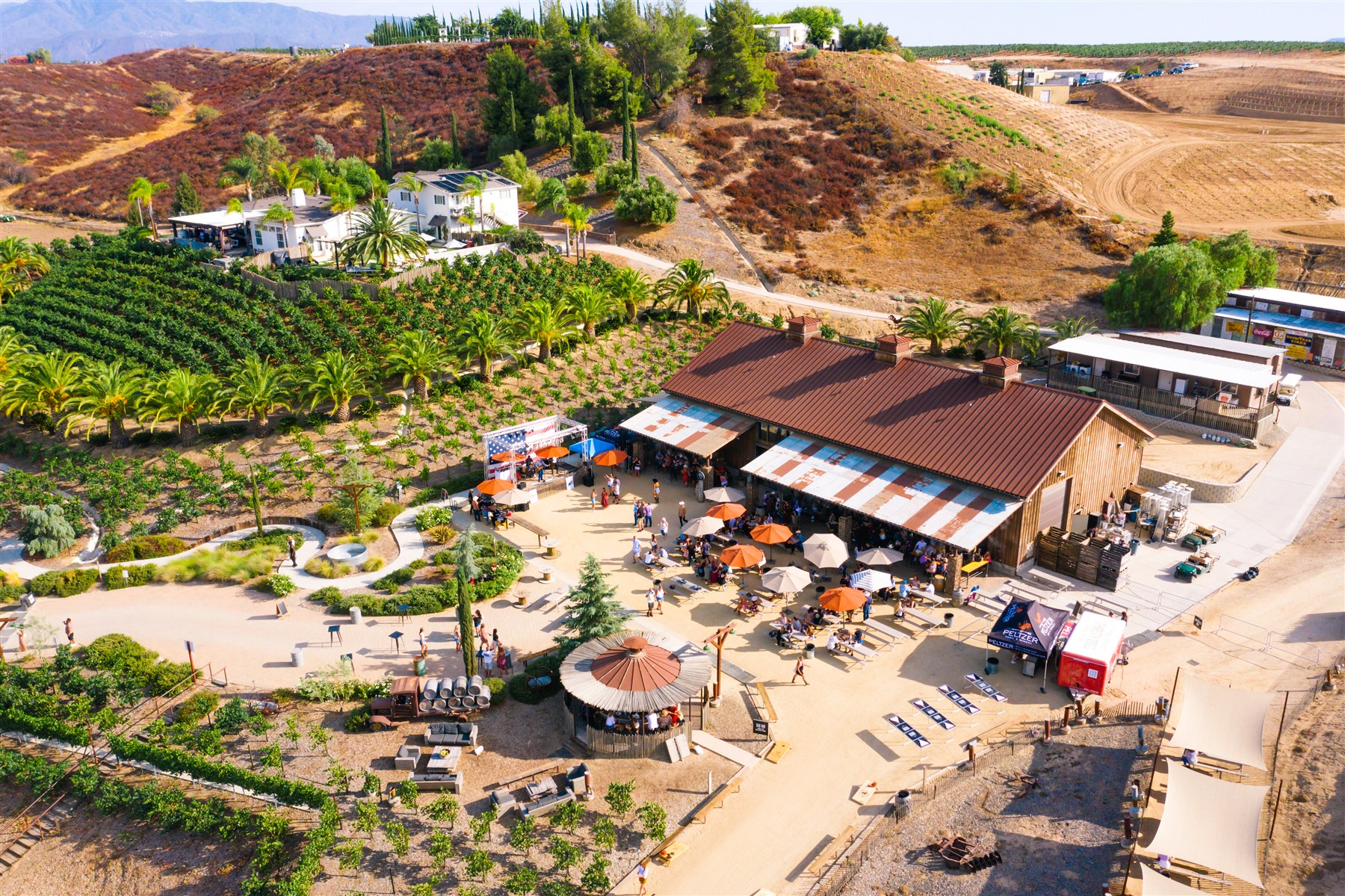 An aerial view of the Crush House and outdoor event areas at Peltzer Winery
