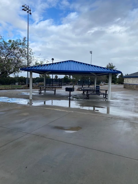 Covered picnic tables at Richard Rollins Community Park